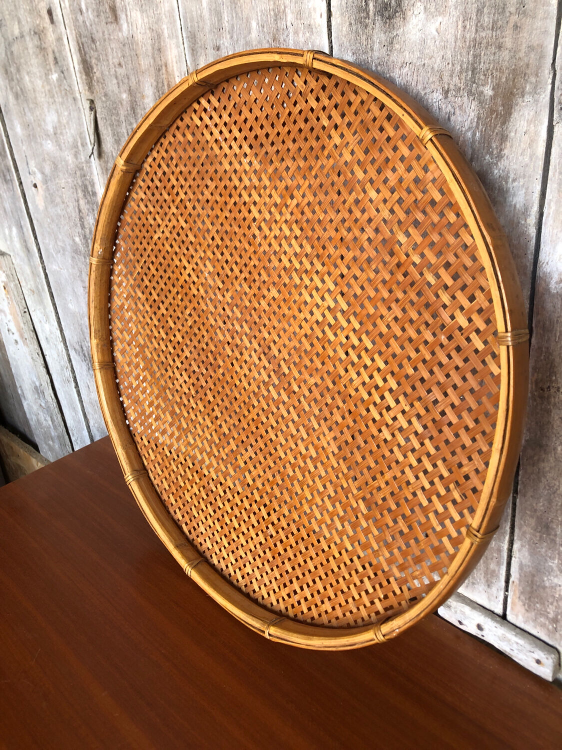 Old vintage braided wicker sieve