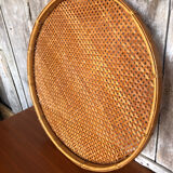 Old vintage braided wicker sieve