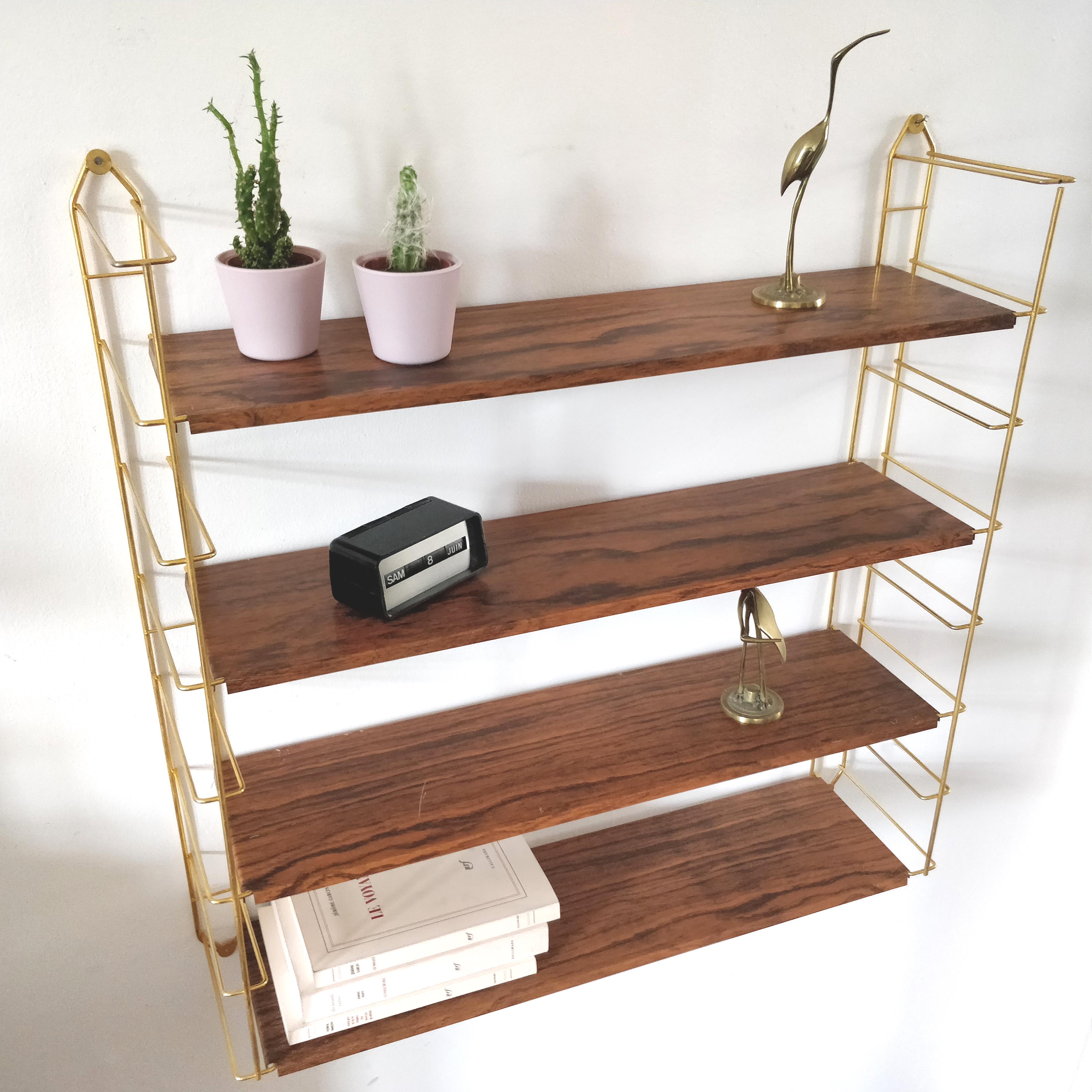 Wood-coloured metal string shelf and gold double studs 1960