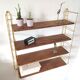 Wood-coloured metal string shelf and gold double studs 1960