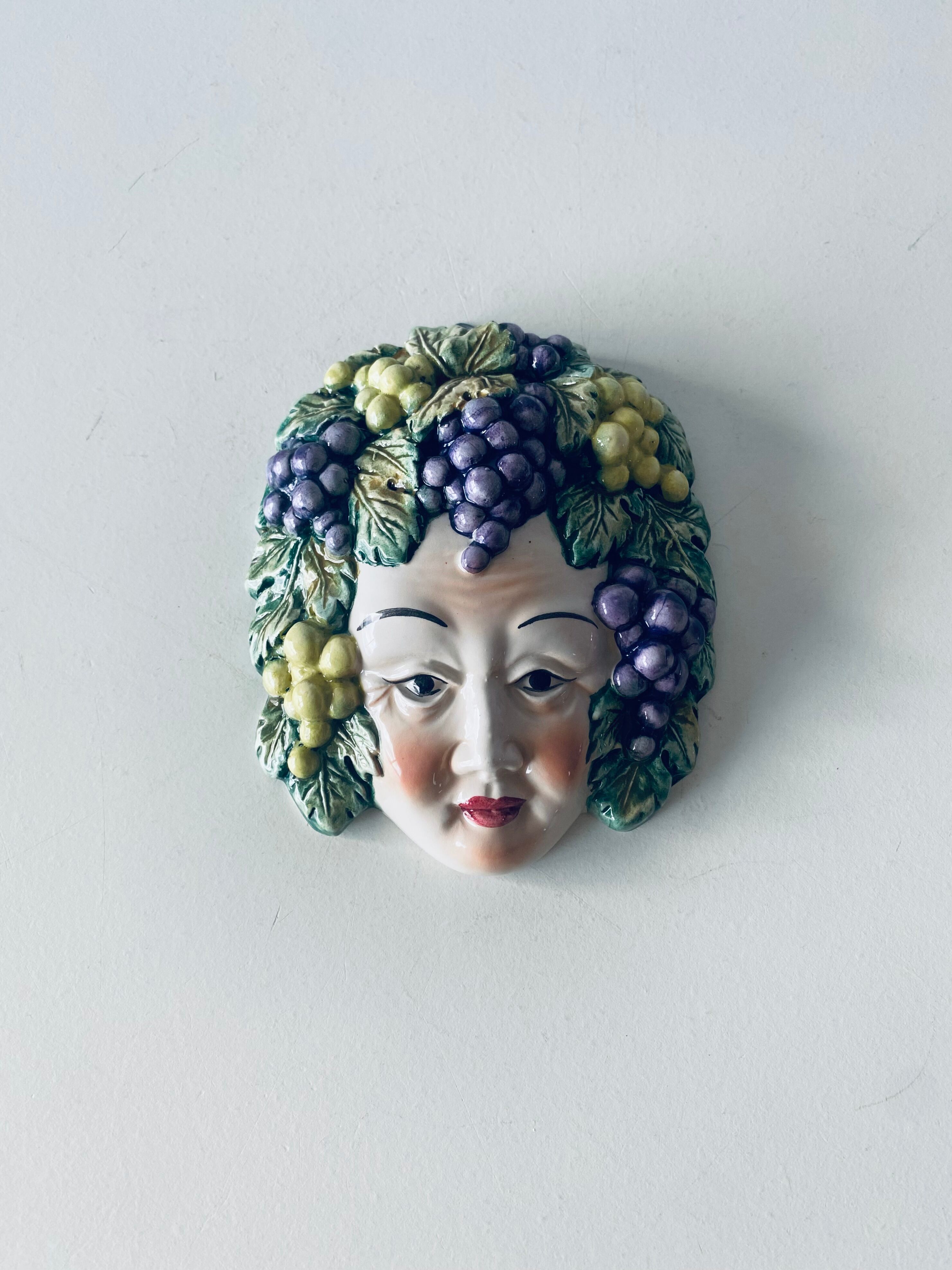Ceramic wall face signed Il Falco