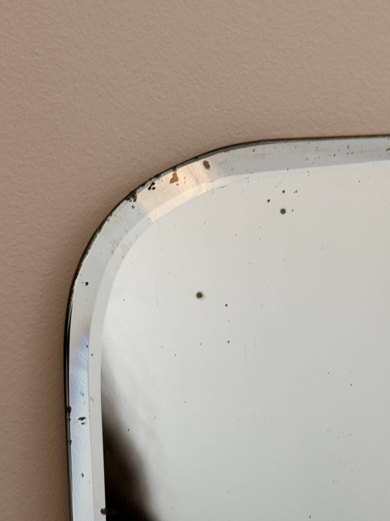 Vintage beveled mirror