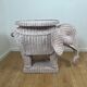 Vintage side table in rattan in the shape of an elephant, attributed to Vivai del Sud, Italy, 1960 - 1970.