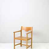 Wooden chair with armrests