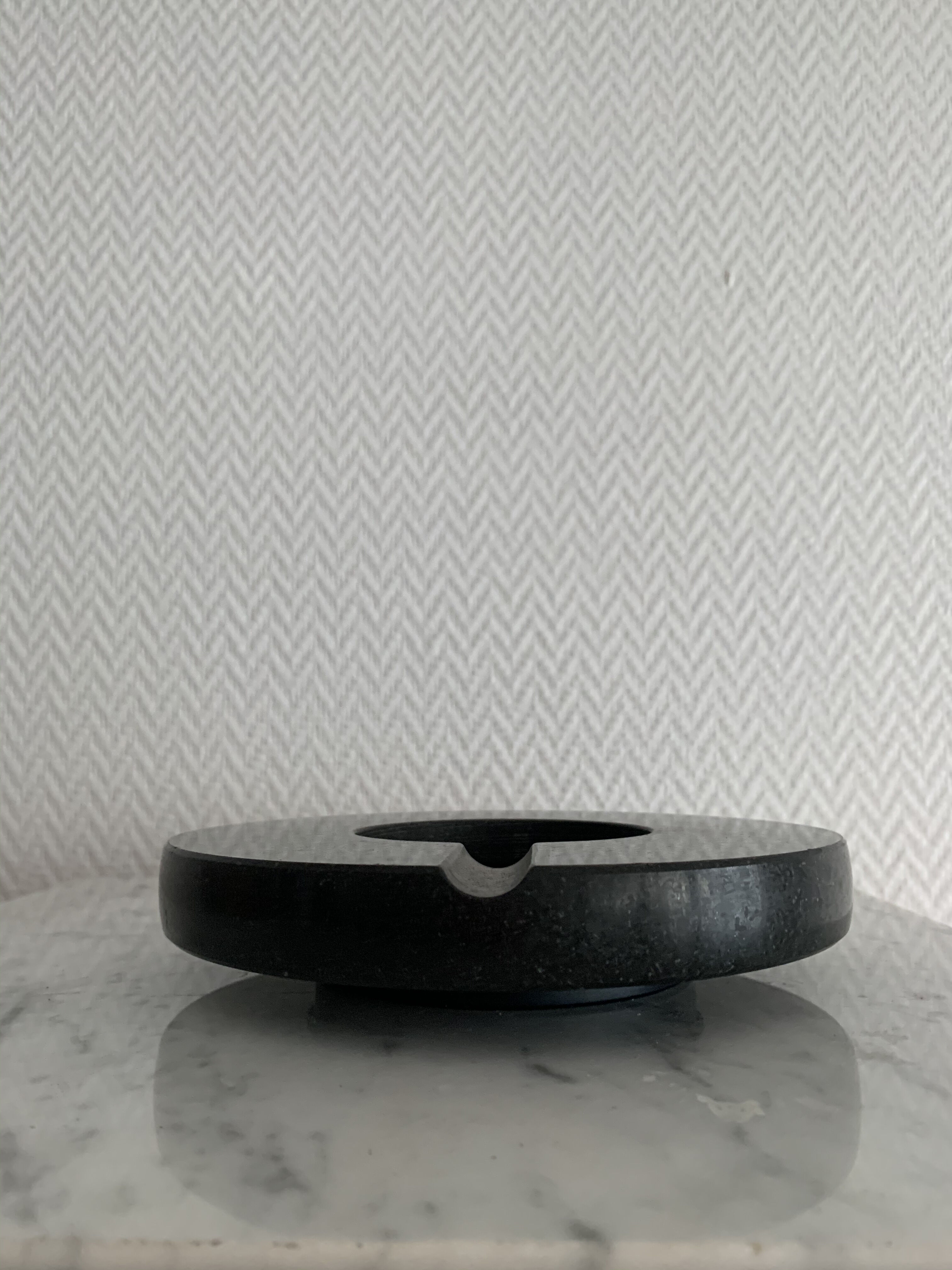 Grey-grey and black speckled marble round ashtray