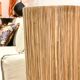 Cylindrical lamp in natural raffia