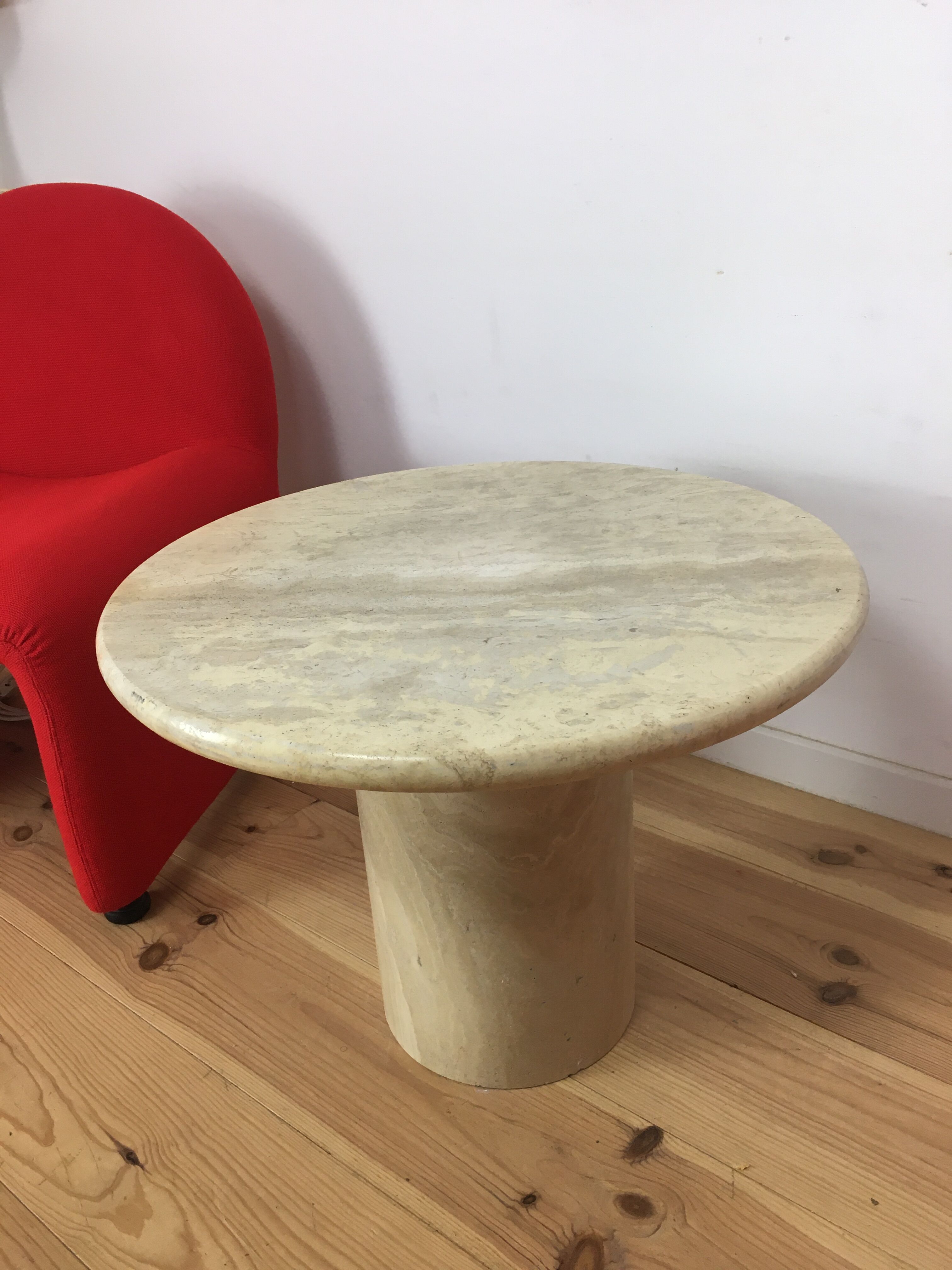 Round travertine coffee table