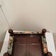 Vintage footrest in wood and fabric
