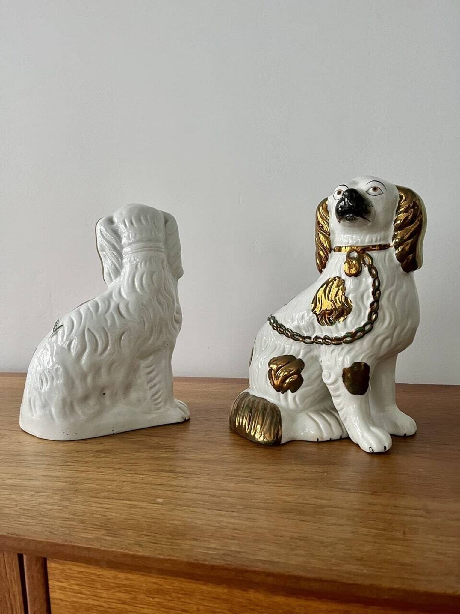 Pair of Staffordshire ceramic dogs – England, 20th century
