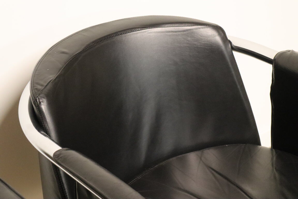 Pair of armchairs in synthetic leather and chromed metal, 1970