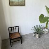 Straw chair by the fireside 1900