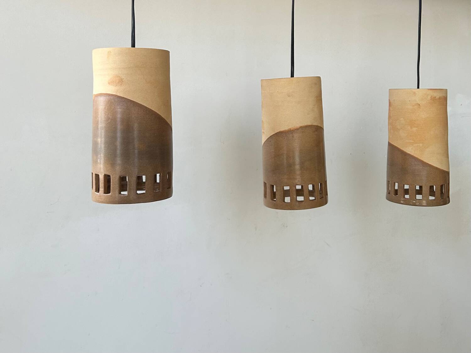 Set of 3 terracotta and enamelled suspensions, France