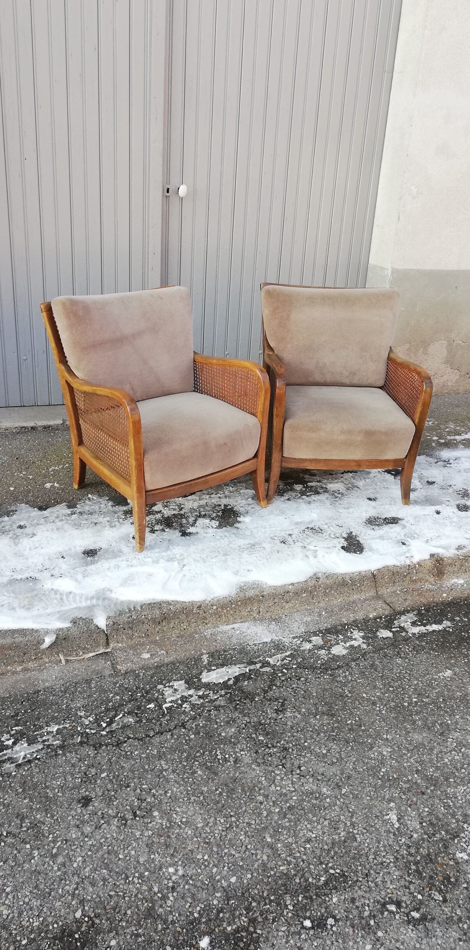 Pair of vintage cannage and fabric armchairs