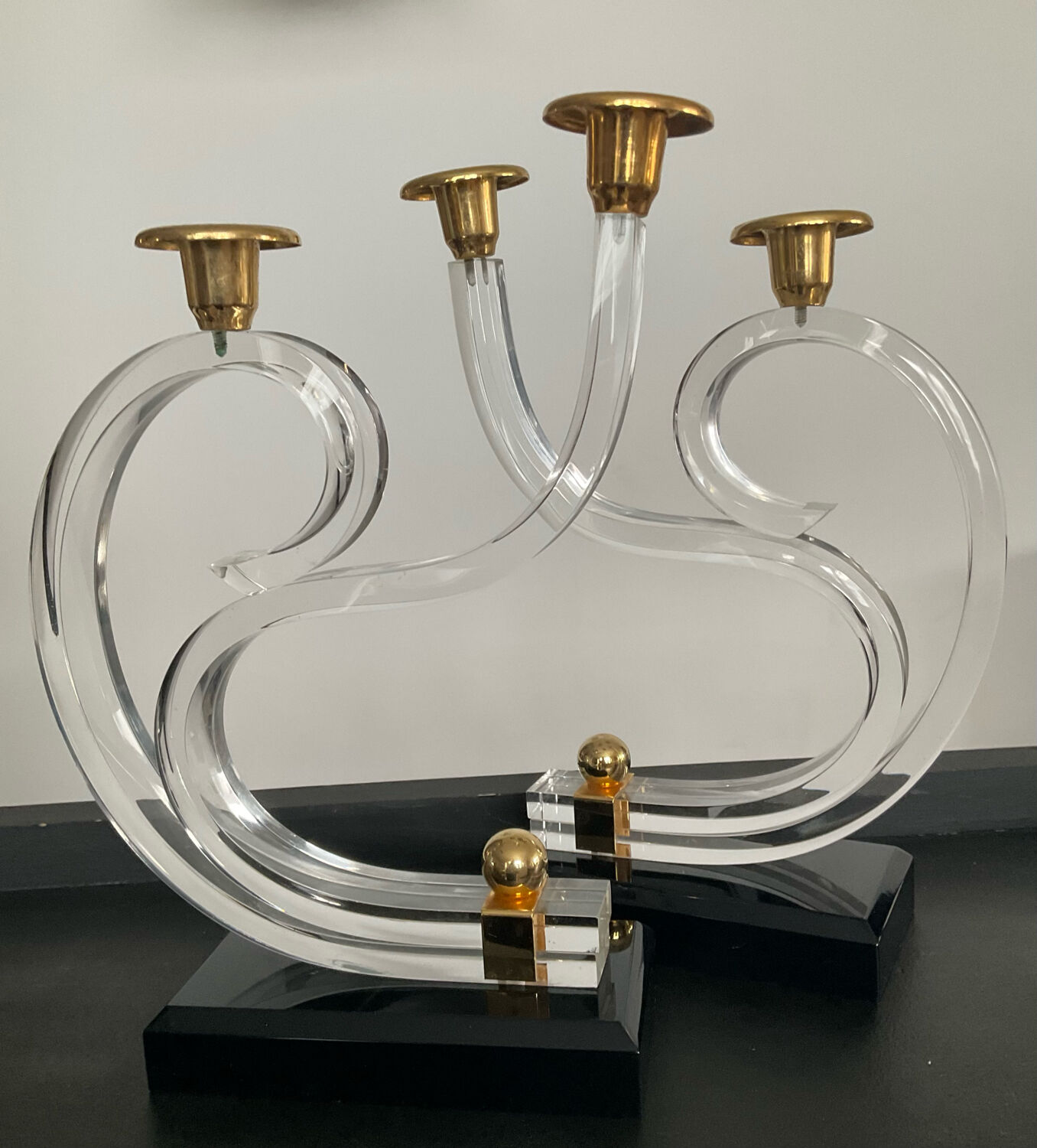 Pair of Hollywood Regency candlesticks in lucite and brass