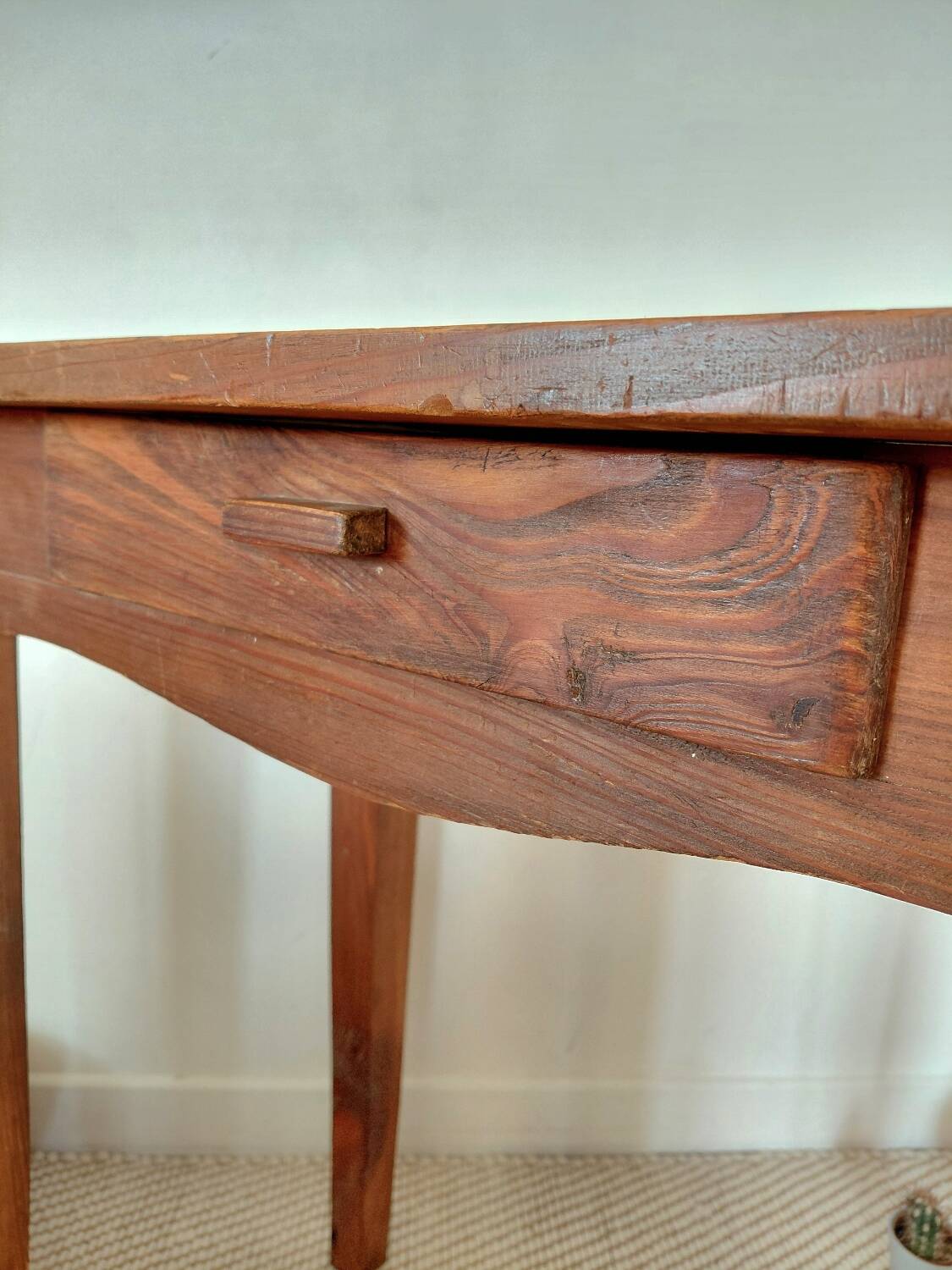 Small antique solid wood table in chic country style with a drawer.