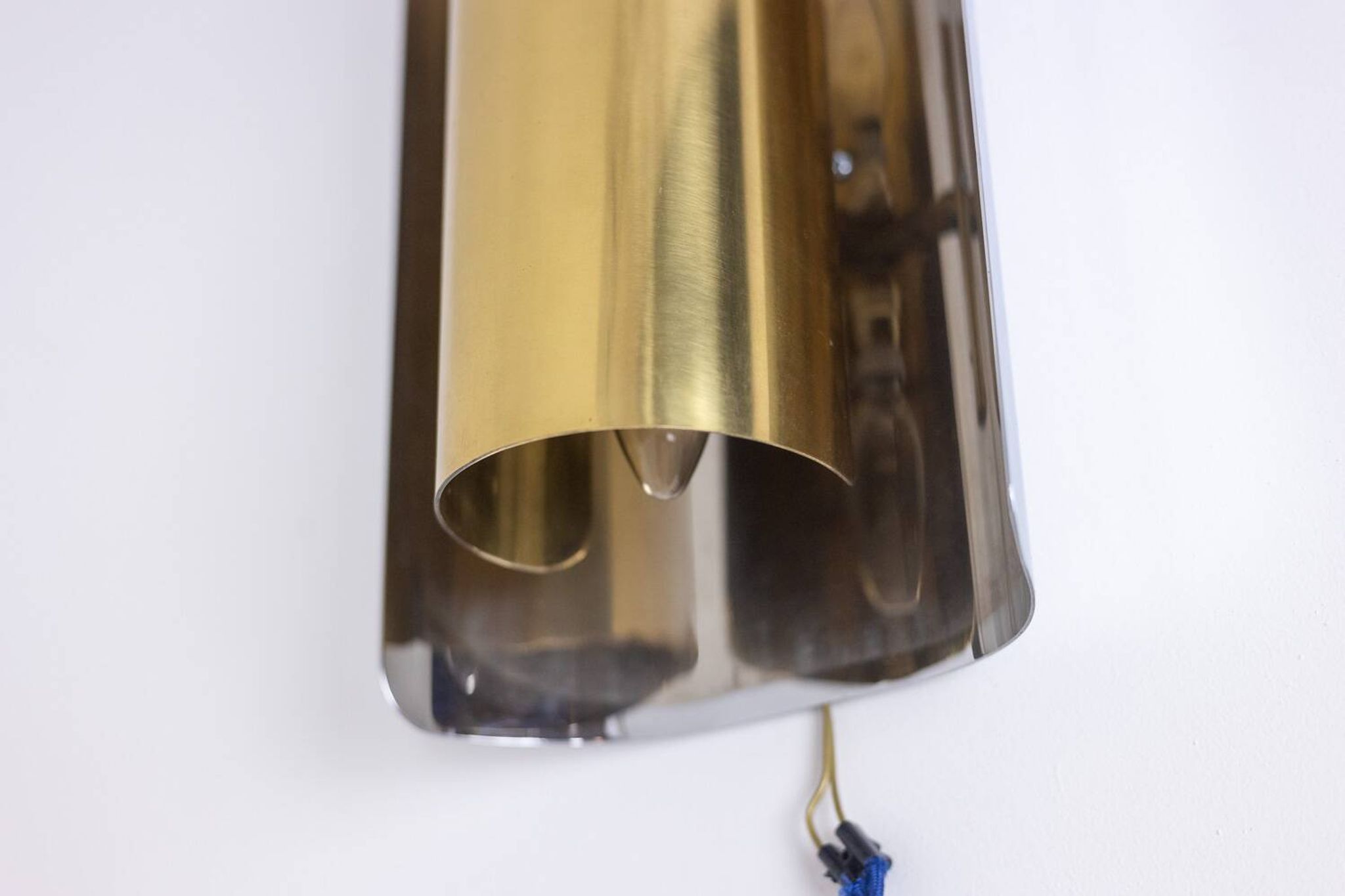 Pair of geometric shaped wall lights. 1970s.