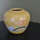 Small yellow fish vase