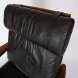 Easy chair with stool in teak upholstered with black leather design Arne Wahl Iversen