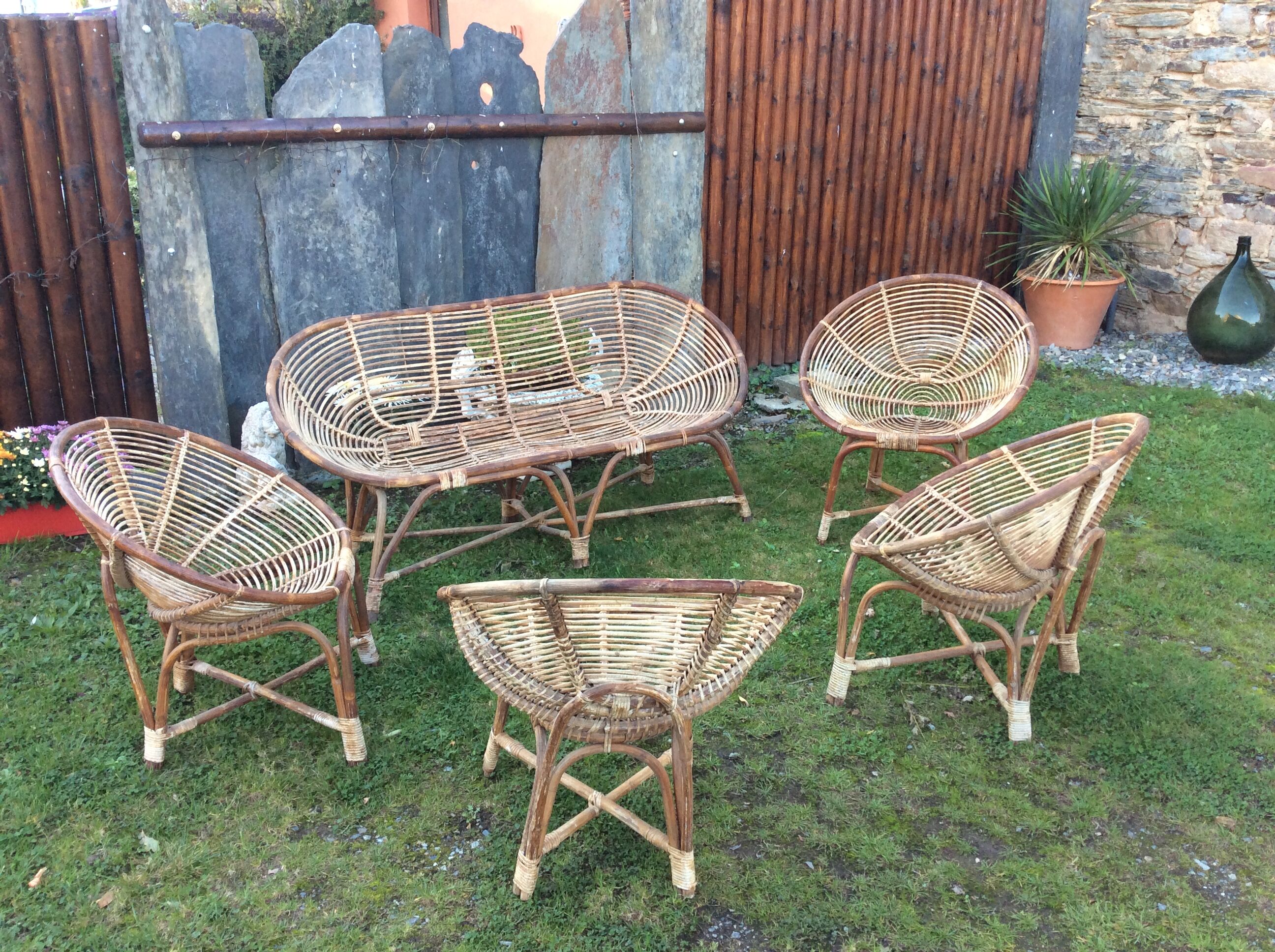 Set of 4 armchairs and 1 vintage rattan bench (5 pieces) inseparable.