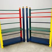 Pair of pencil-style shelves by Pierre Sala for children.