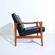 Vintage Scandinavian lounge chair by Bröderna Andersson, teak and black faux leather upholstery, 1950s-1960s.