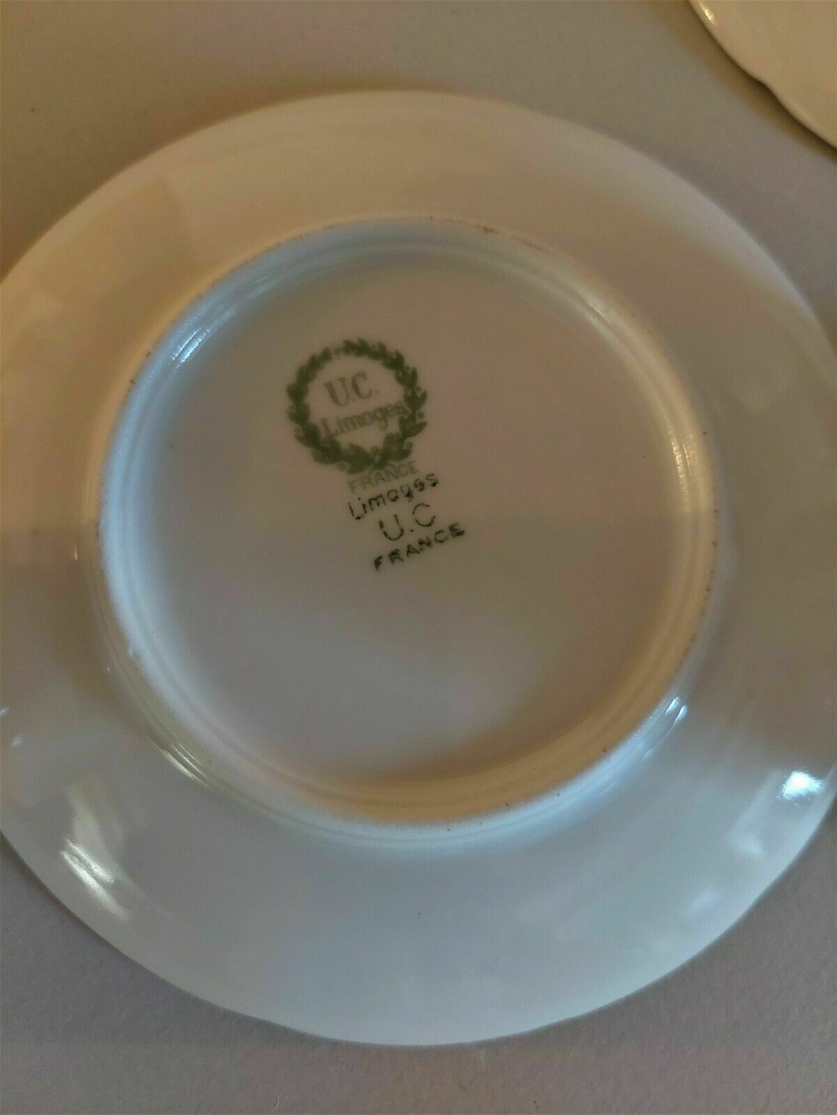 Porcelain cups UC Limoges, series of three