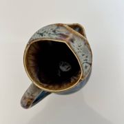 Flamed blue tripod jug