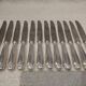 12 silver-plated dessert knives by Christofle Vendôme, 19.7cm