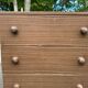 commode 4 tiroirs compacte — Effet bois foncé