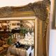 Golden wooden mirror in Louis XV style