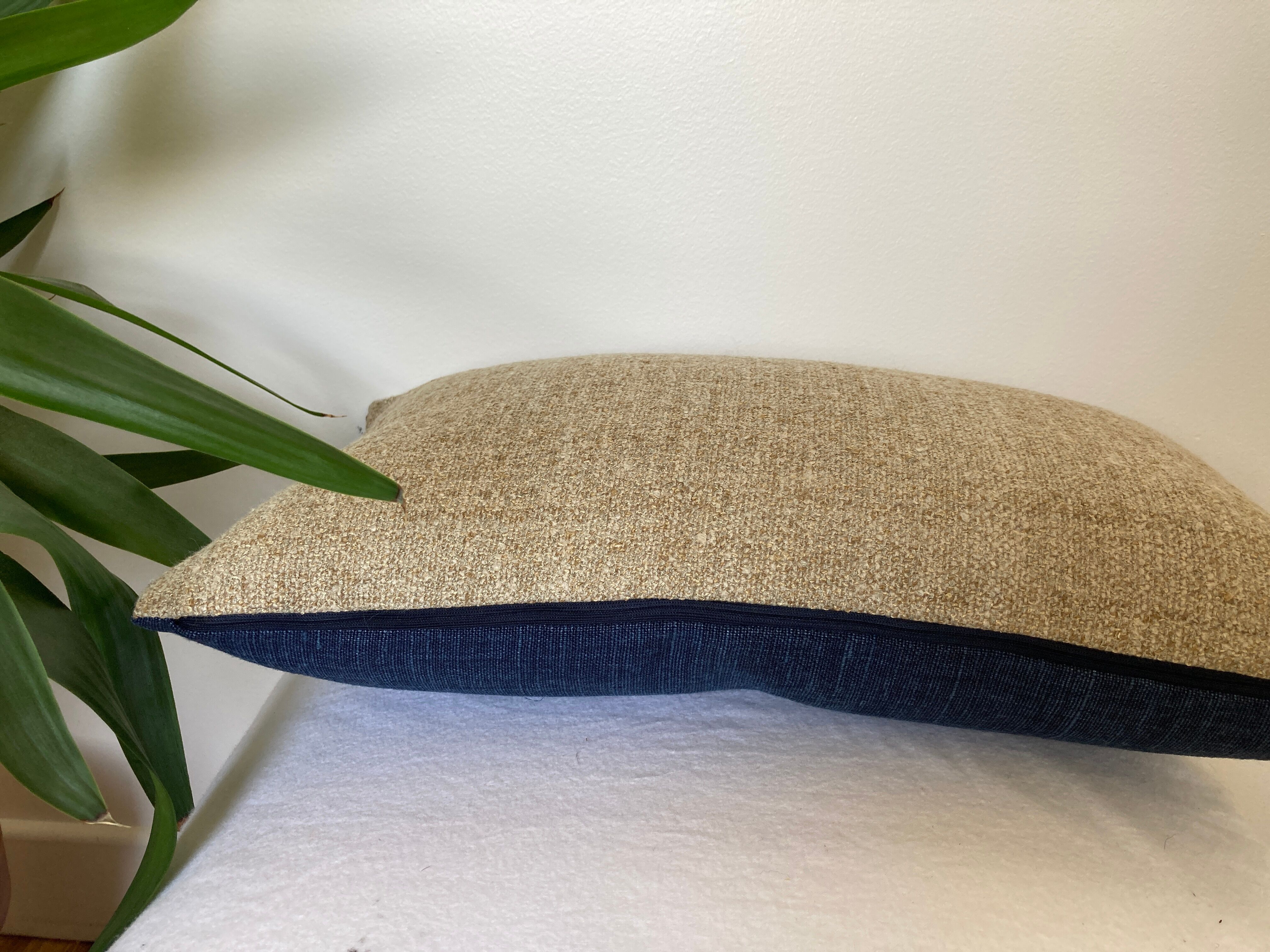 Double-sided beige navy blue cushion