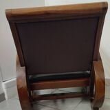 Leather and teak armchair