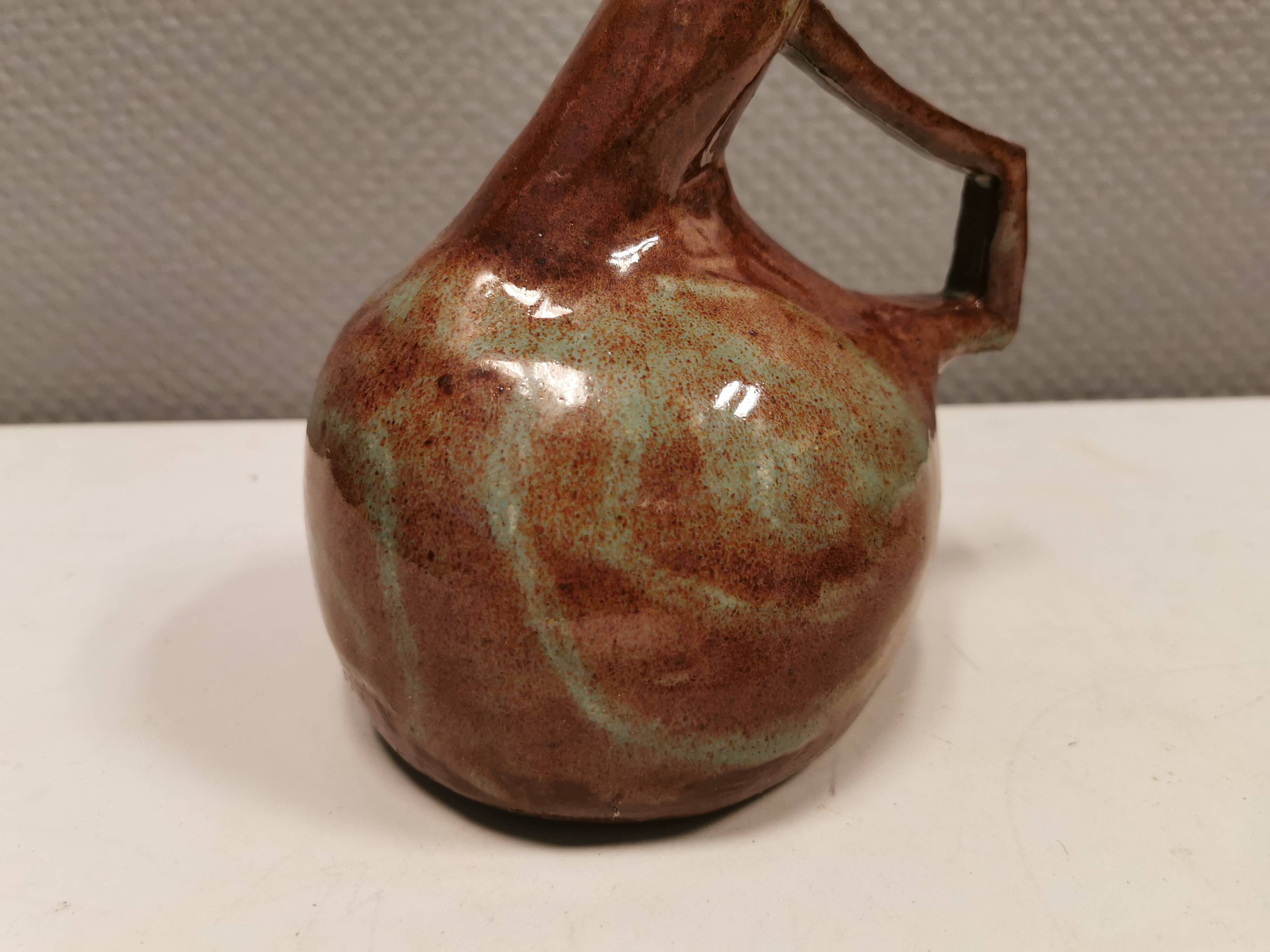 Ceramic jug/vase, Danish in beautiful earthy brown colours with light blue/green details.
