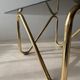 Coffee table with smoked glass and curved metal base