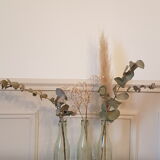 Suite of three old small glass bottles