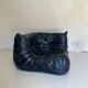 Chauffeuse d'angle Togo en cuir noir par Ligne Roset