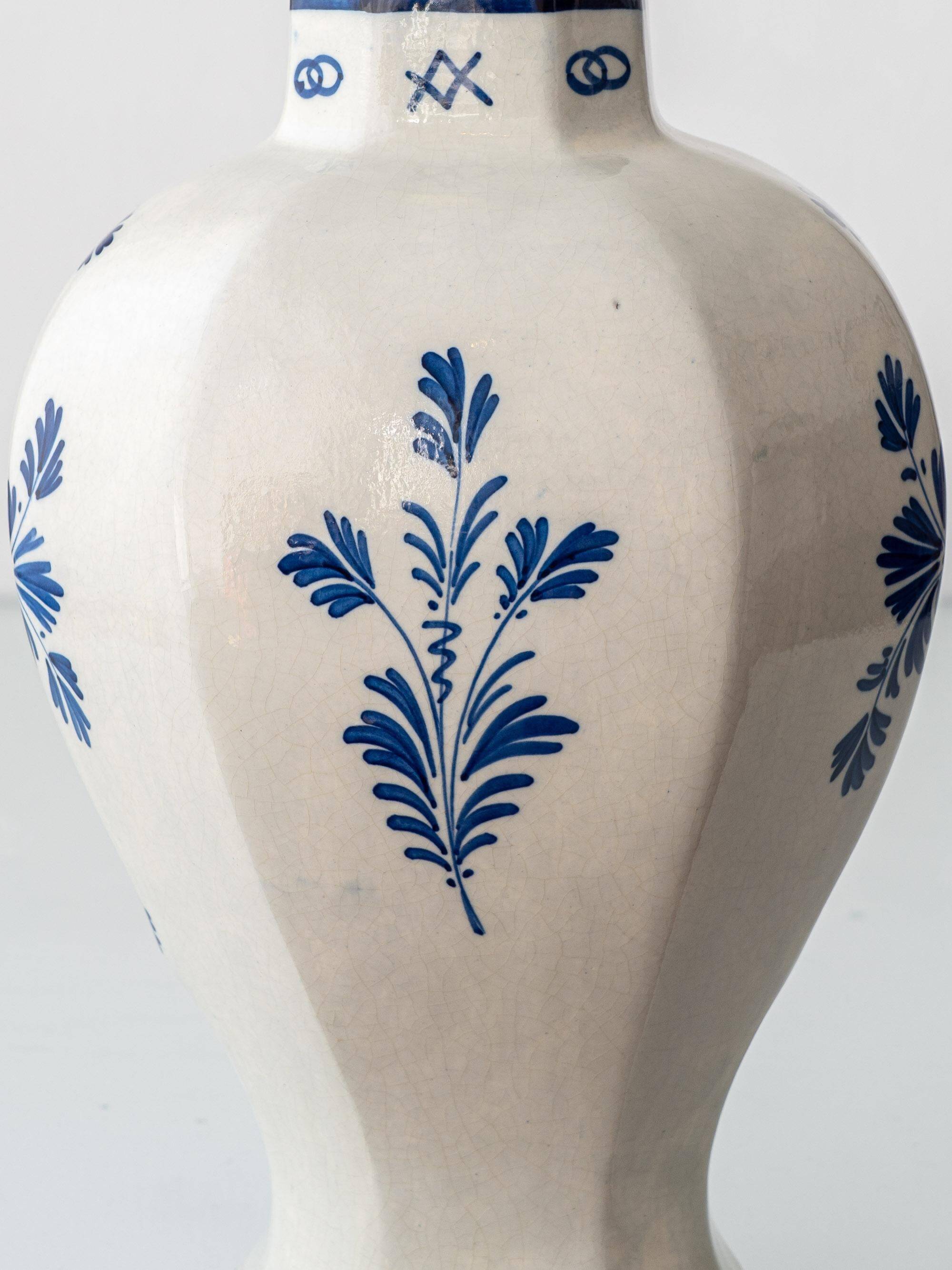 Pair of Royal Delft blue and white ceramic table lamps, 1905, with new pleated silk shades.