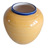 Vintage ceramic vase in a round shape.