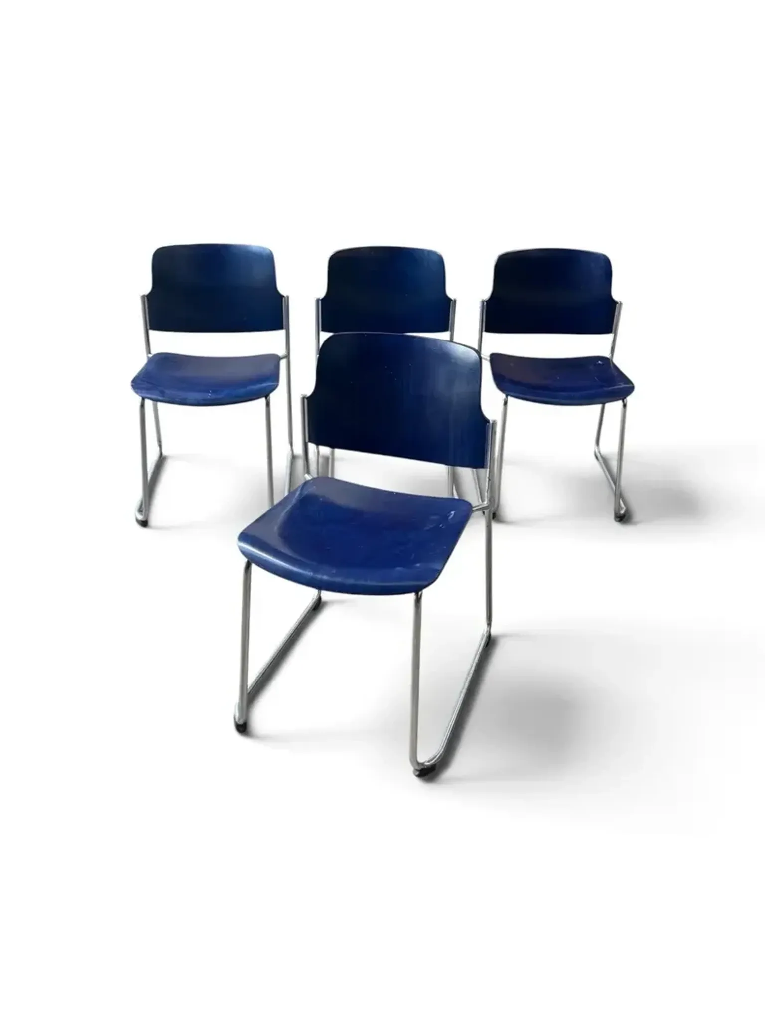 Vintage blue chairs, chrome metal structure, modern mid-century retro seats