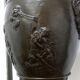Patinated bronze lamp base medal
