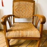 Two contemporary teak and rattan armchairs