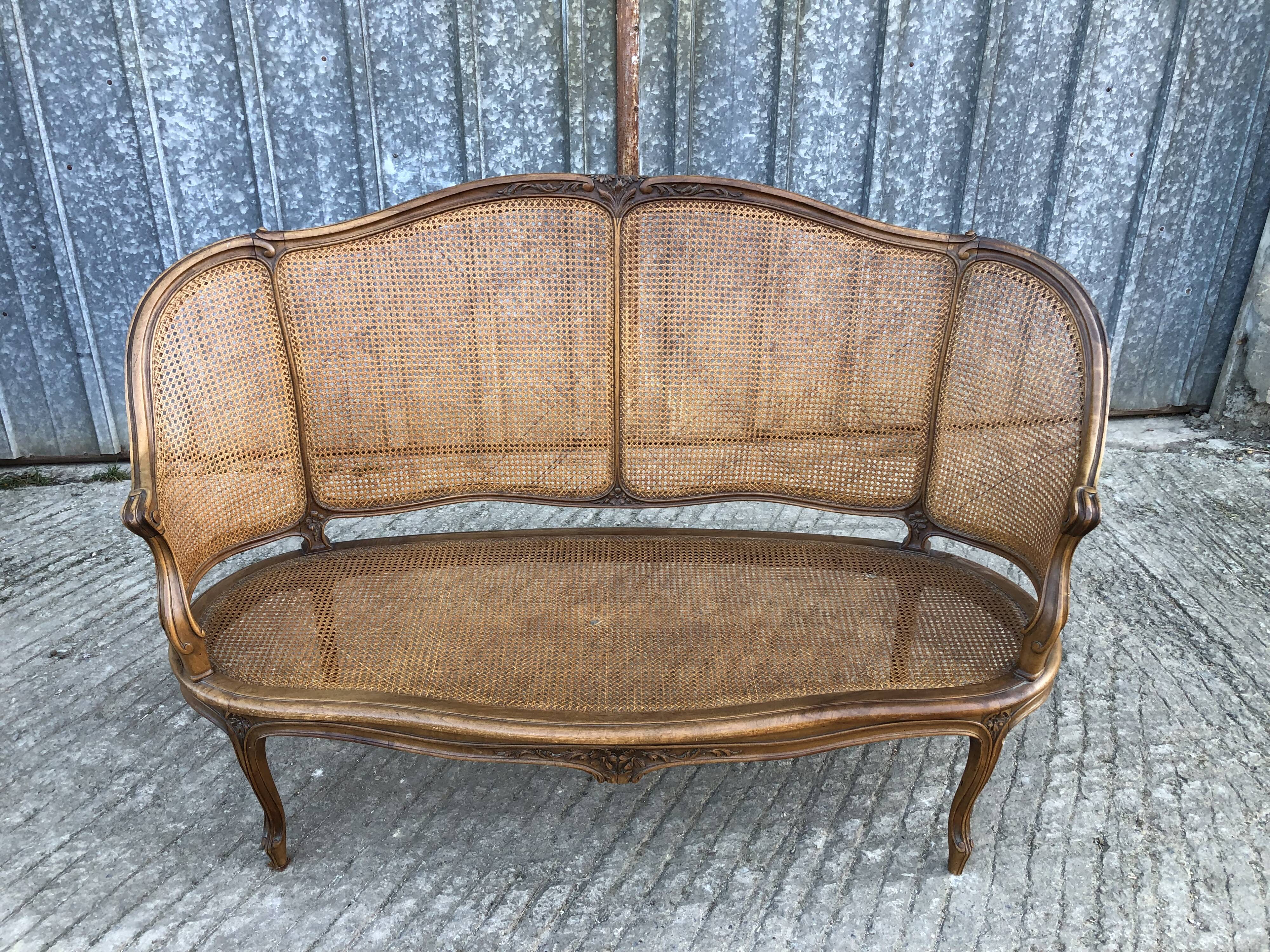 Antique Louis XV bench in solid walnut and caning