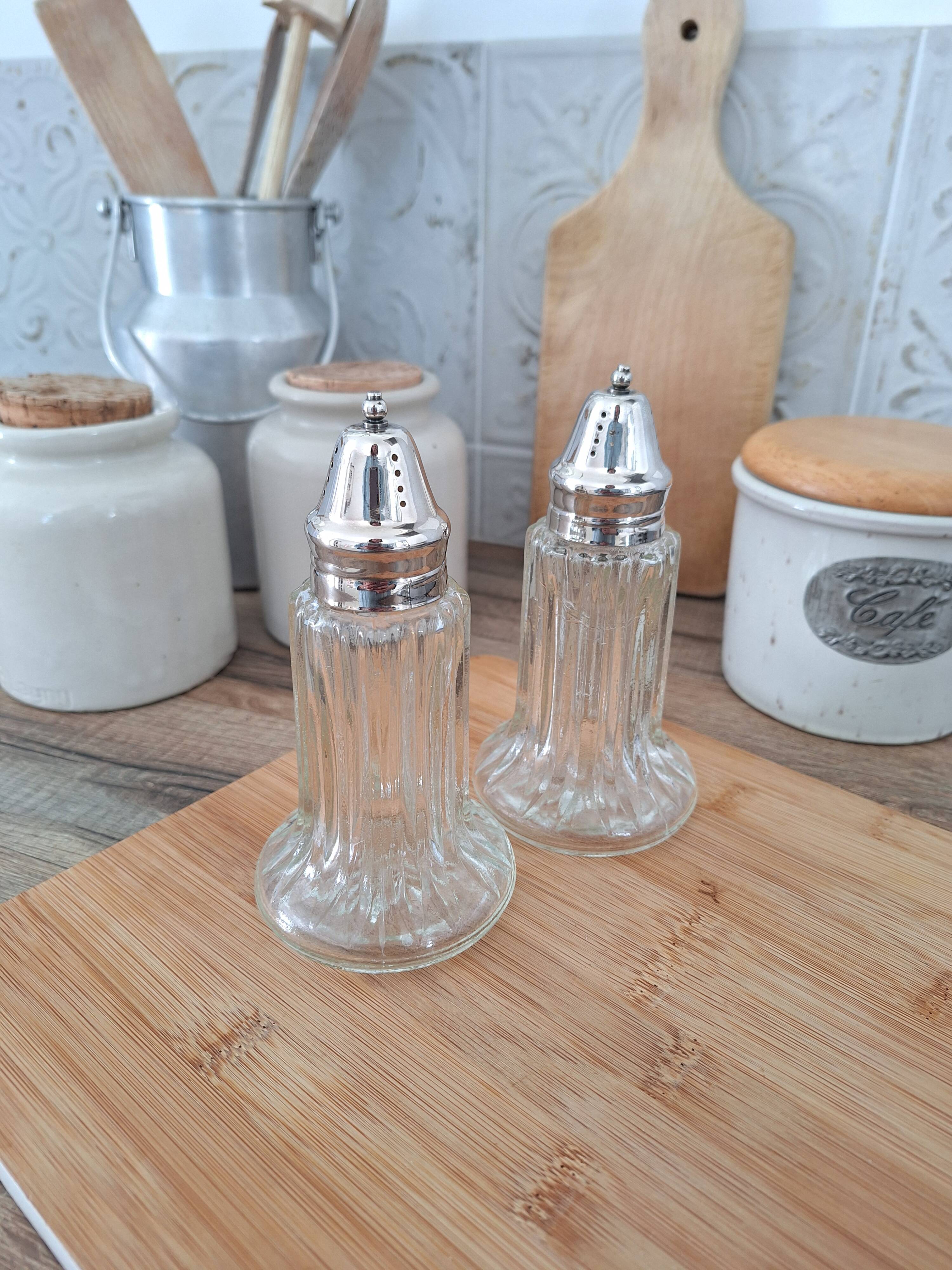 Glass and metal salt and pepper shakers