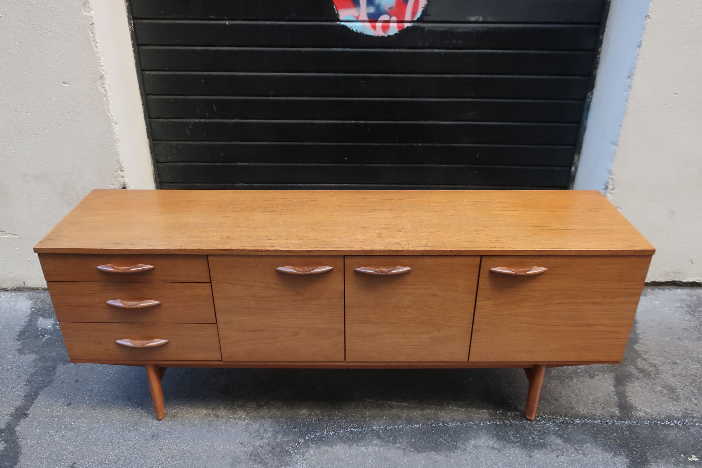 Row in the 1960s teak