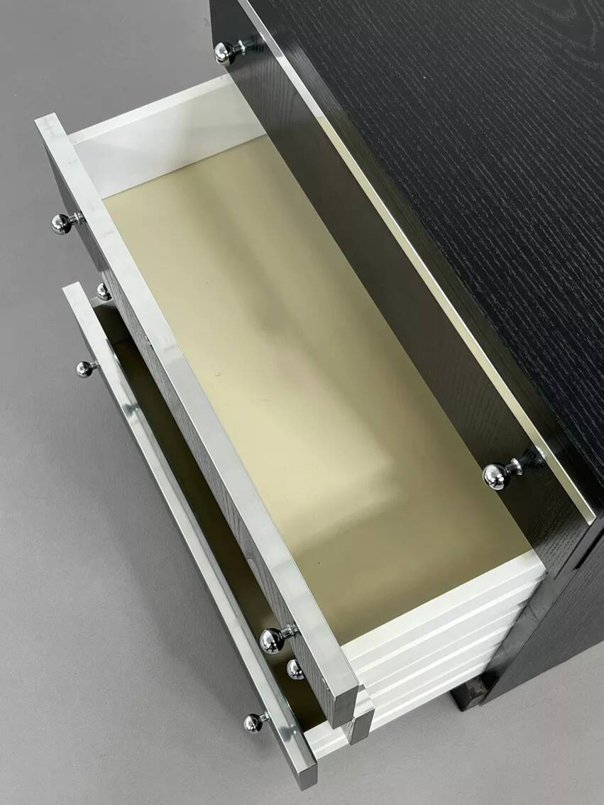 Pair of black and chrome 4-drawer chests of drawers