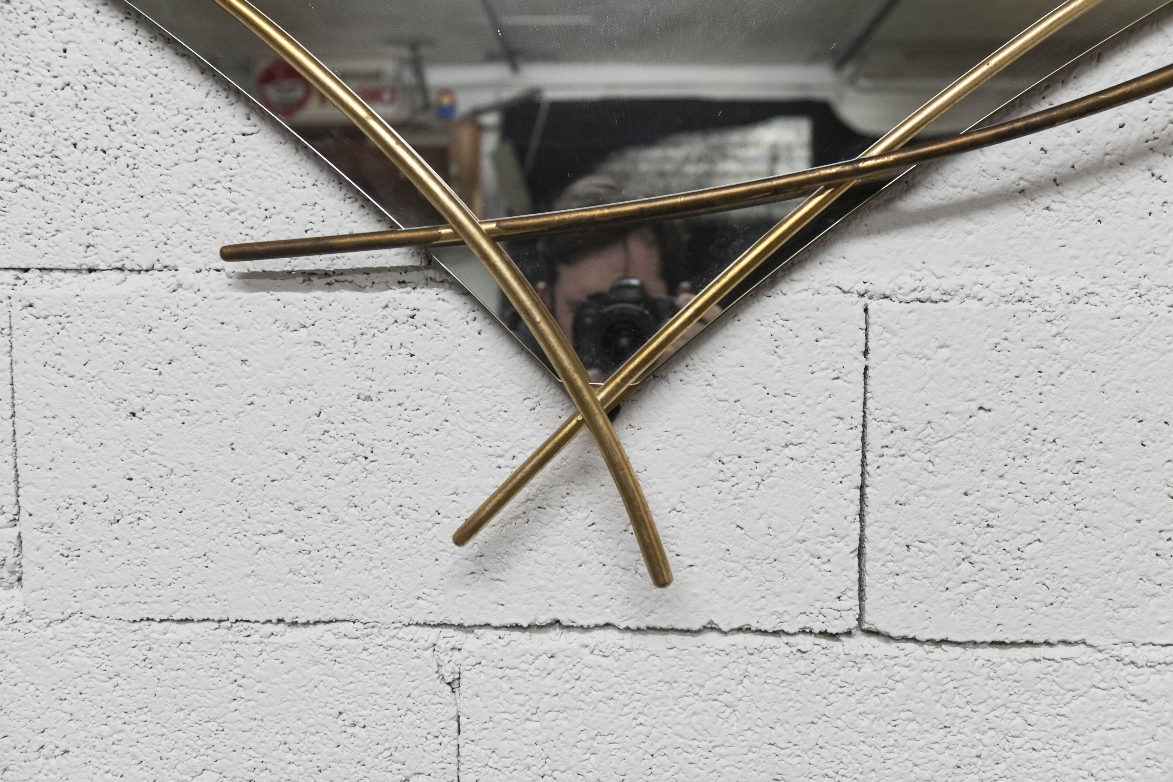 Sculptural mirror with two-tone gilded arches, France, 1970s, 95 x 133 cm