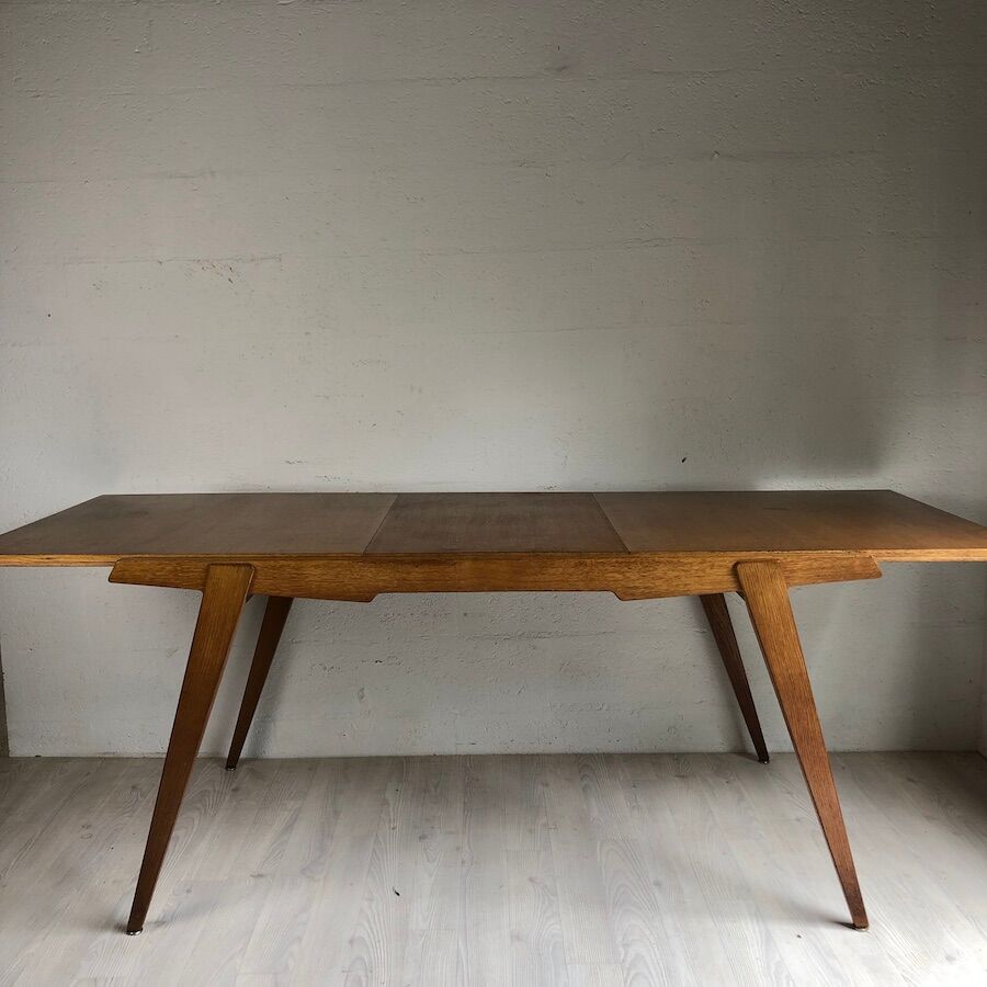 Dining table by Gérard Guermonprez by Magnani (1957)