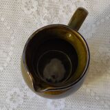 Green ceramic pitcher