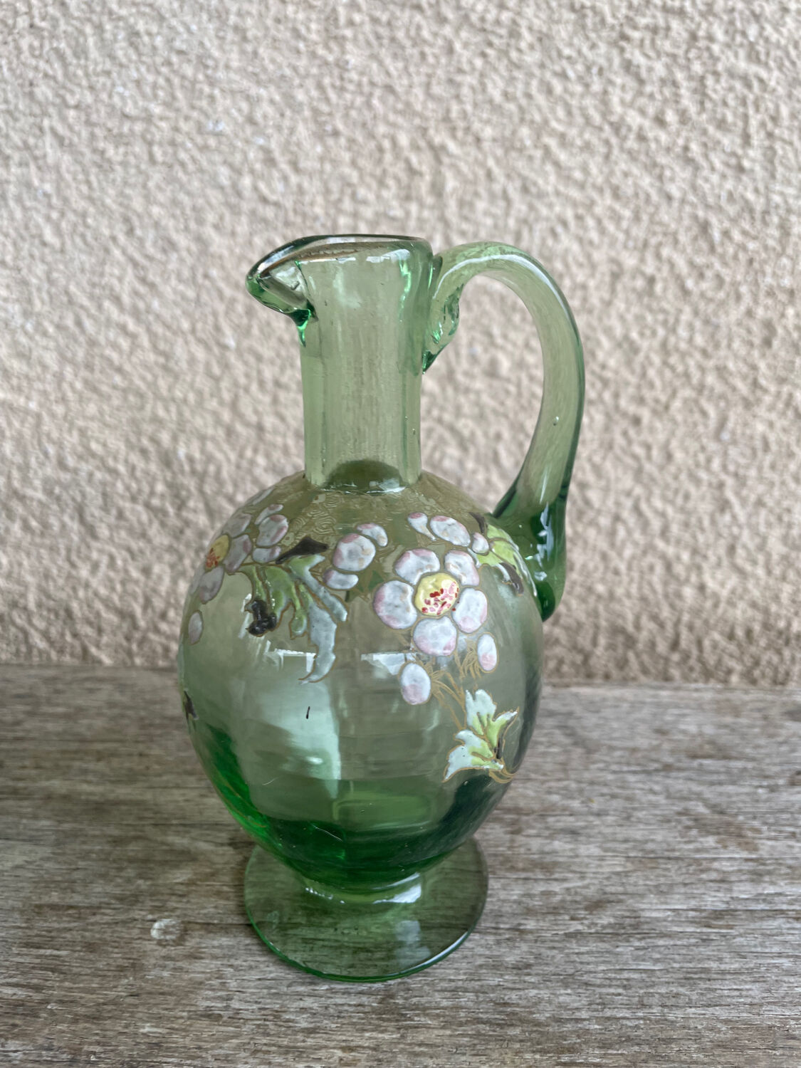 Antique liqueur service, enamelled decanter and glasses.