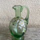 Antique liqueur service, enamelled decanter and glasses.